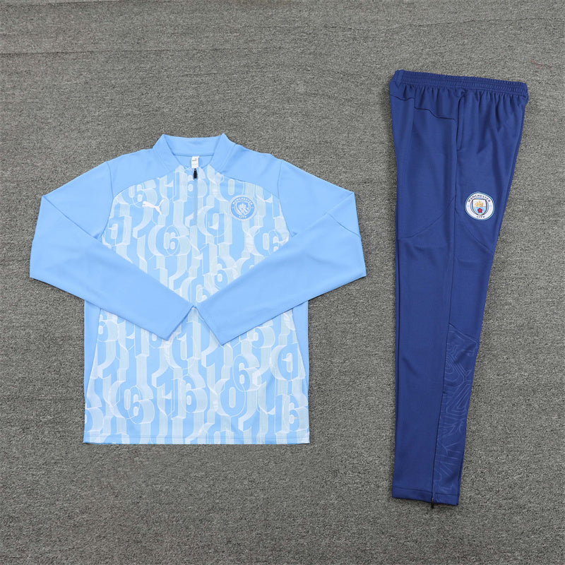 2024/2025 Manchester City tracksuit set with official logos and modern fit.
