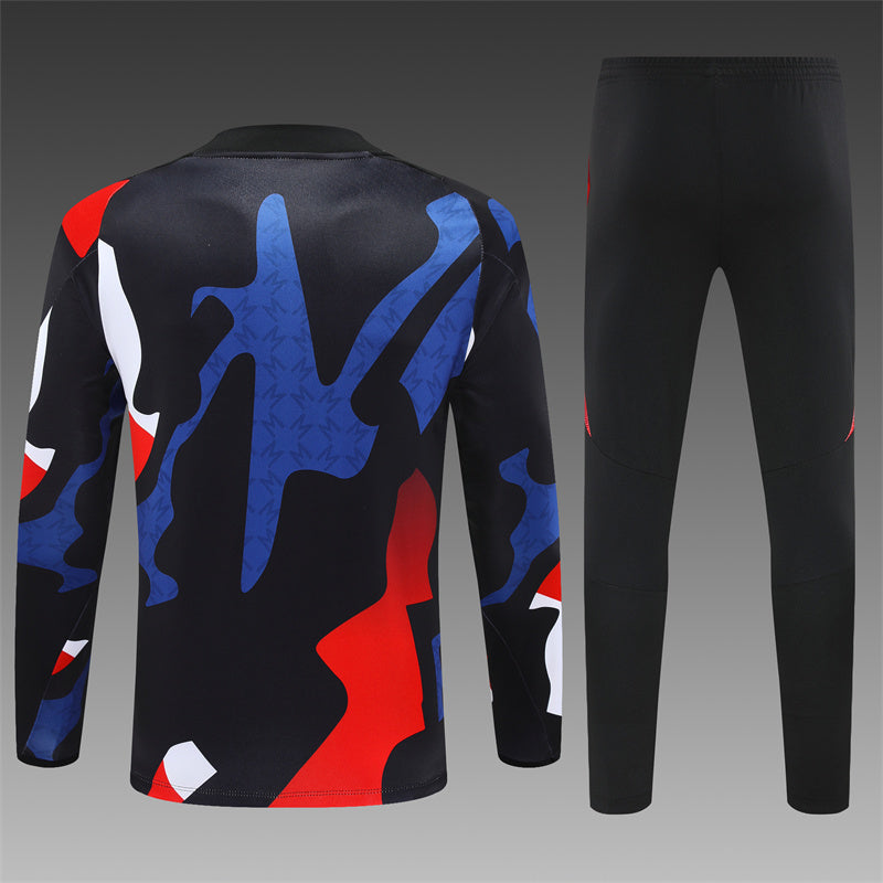 Back View of Manchester United Tracksuit 24/25 – The back view of the tracksuit, showcasing the clean design and Manchester United emblem.