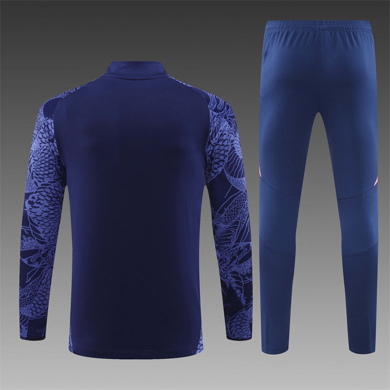 Back of Real Madrid dragon tracksuit for kids showing detailed graphic
