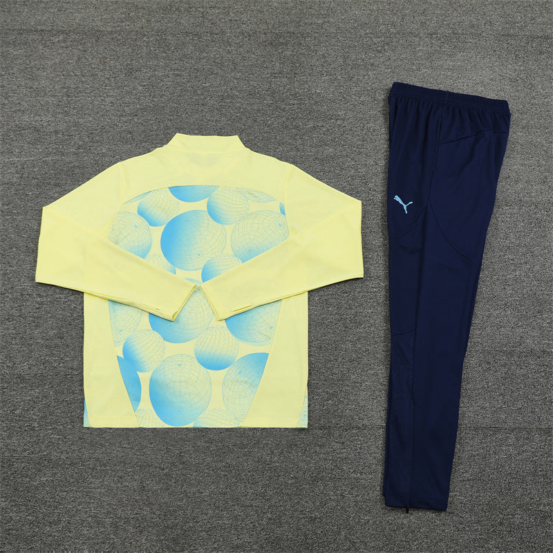 Back of the Manchester City 24/25 tracksuit showcasing clean design
