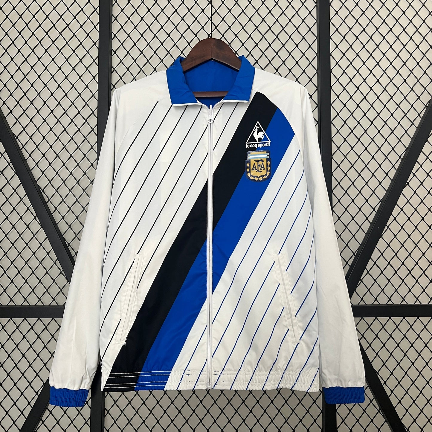 Close-up of Argentina football crest on trench coat