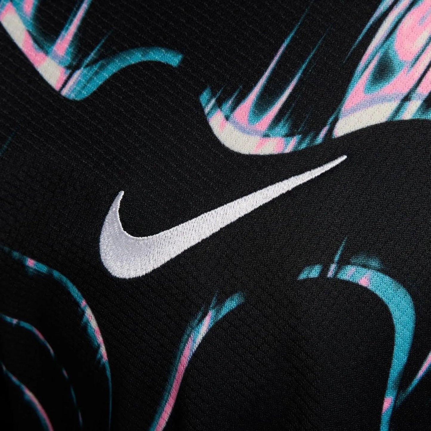 Close-up of Korea x Stussy Black Jersey Logo and Crest featuring premium detailing