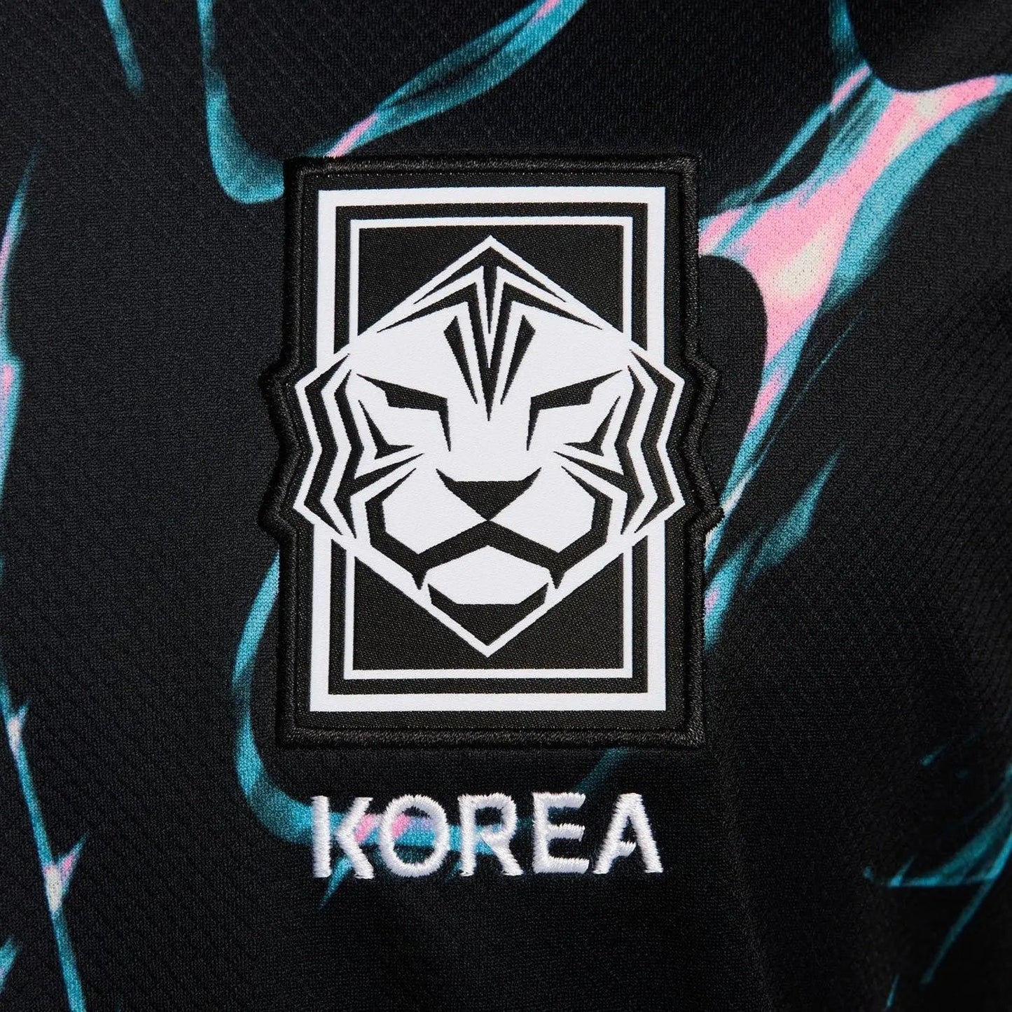 Fabric and Texture Details of Korea x Stussy Black Football Jersey highlighting quality materials