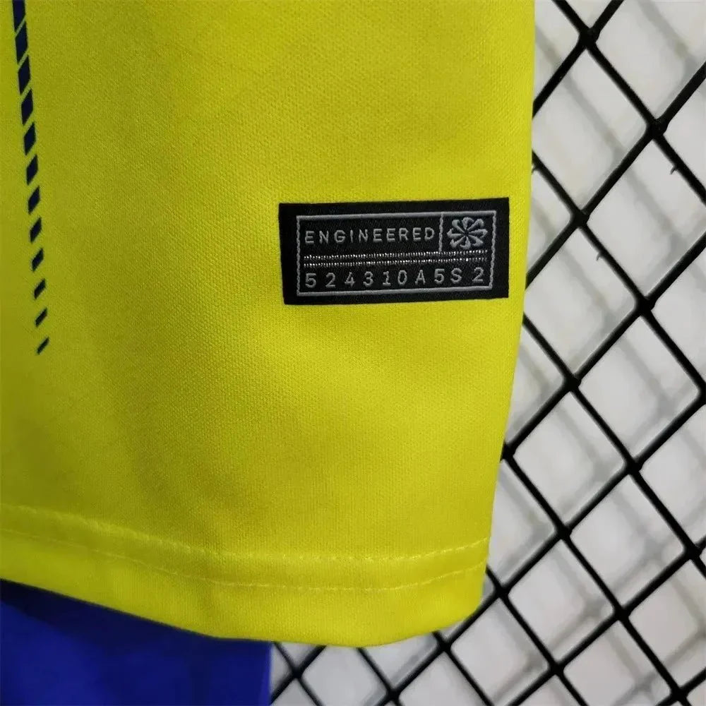Yellow Al-Nassr football kit for boys and girls