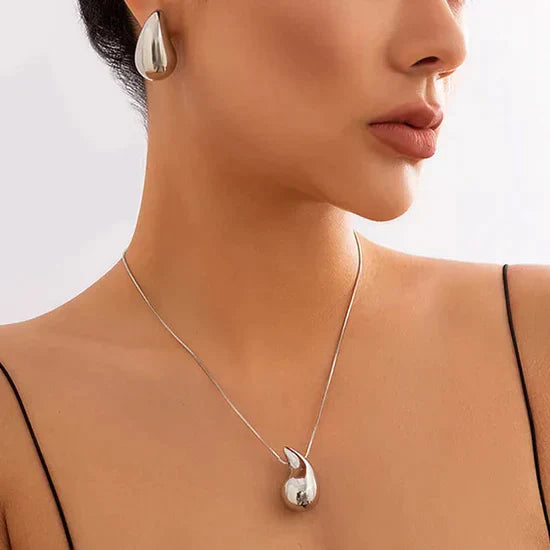 Women's Elegant Gold Teardrop Earrings | Sleek Polished Design