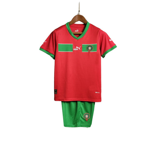 Front view of Morocco 23/24 home kids jersey and shorts