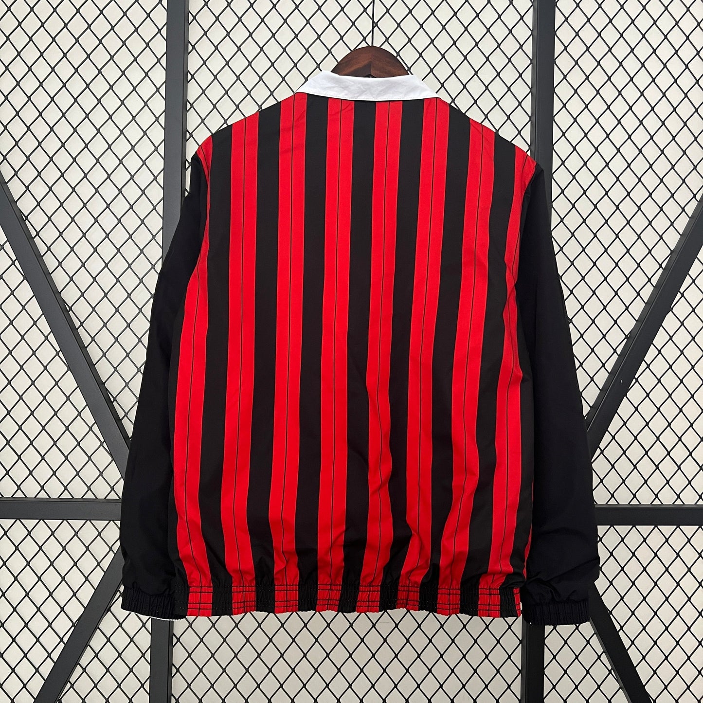 Back of AC Milan trench coat showing alternate color side