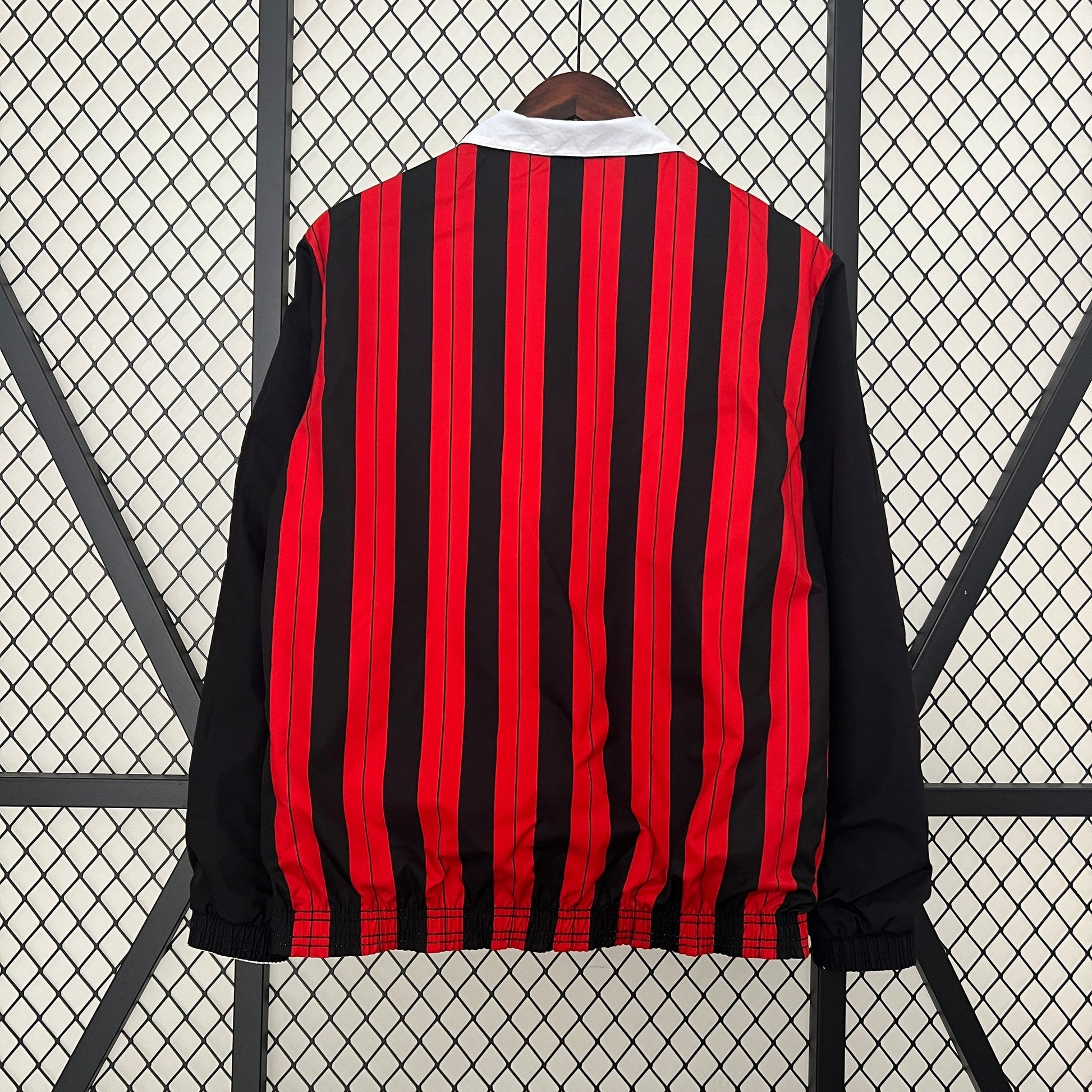 Back of AC Milan trench coat showing alternate color side