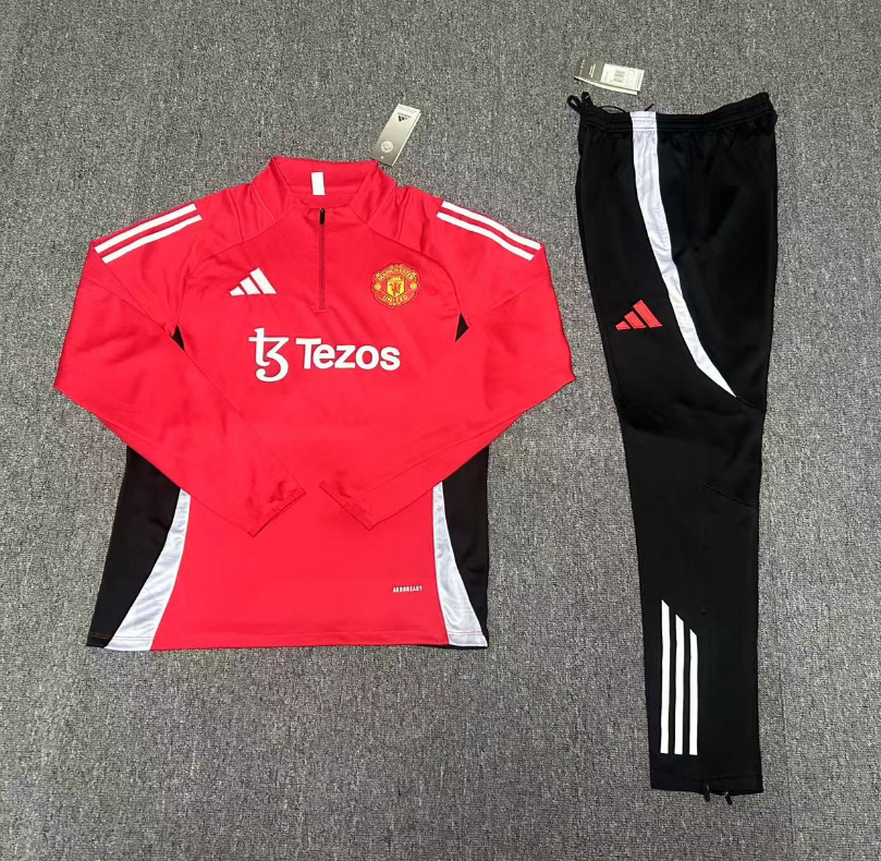 Detailed close-up of the Manchester United 24/25 Tracksuit with a focus on the fabric and quality design