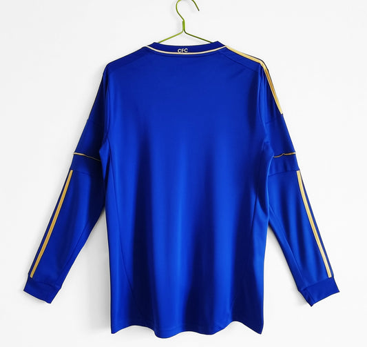 Front view of the Chelsea 2012/13 Home Shirt, with long sleeves, club crest, and sponsor logo