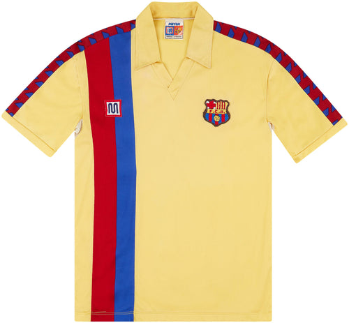 Front view of 1982–85 Barcelona away jersey by Meyba in yellow with red and blue stripe