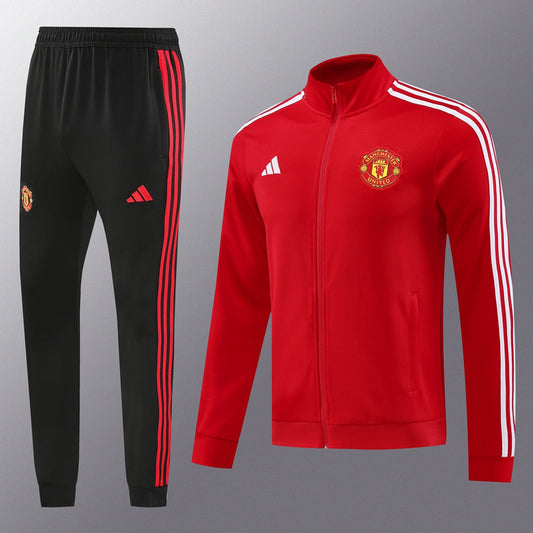 Manchester United Full Zip Tracksuit 2025 - Front View – A close-up view of the full zip tracksuit, showcasing its classic Manchester United design and bold branding.
