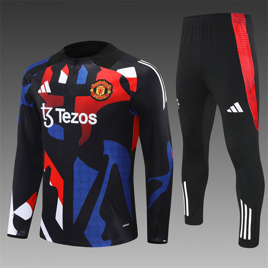 Manchester United Tracksuit 24/25 - Front View – Full front view of the tracksuit, highlighting the sleek design and iconic Manchester United crest.