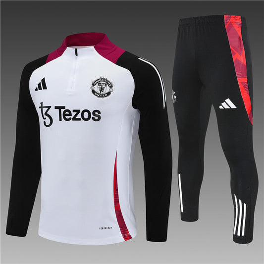 Manchester United White Tracksuit 24/25 - Front View – Full view of the white Manchester United tracksuit, showcasing the iconic crest and sleek design.