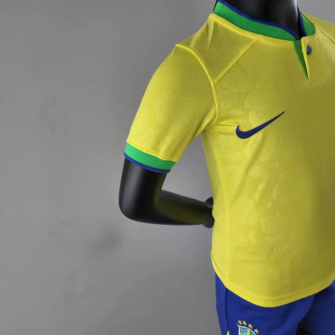 Young fan wearing Brazil 2022 World Cup home kit