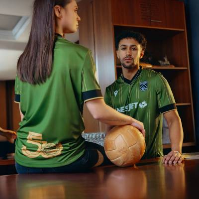 Back view of the Cavalry FC 2025 kit, showcasing the Spruce Meadows 50th Anniversary emblem.