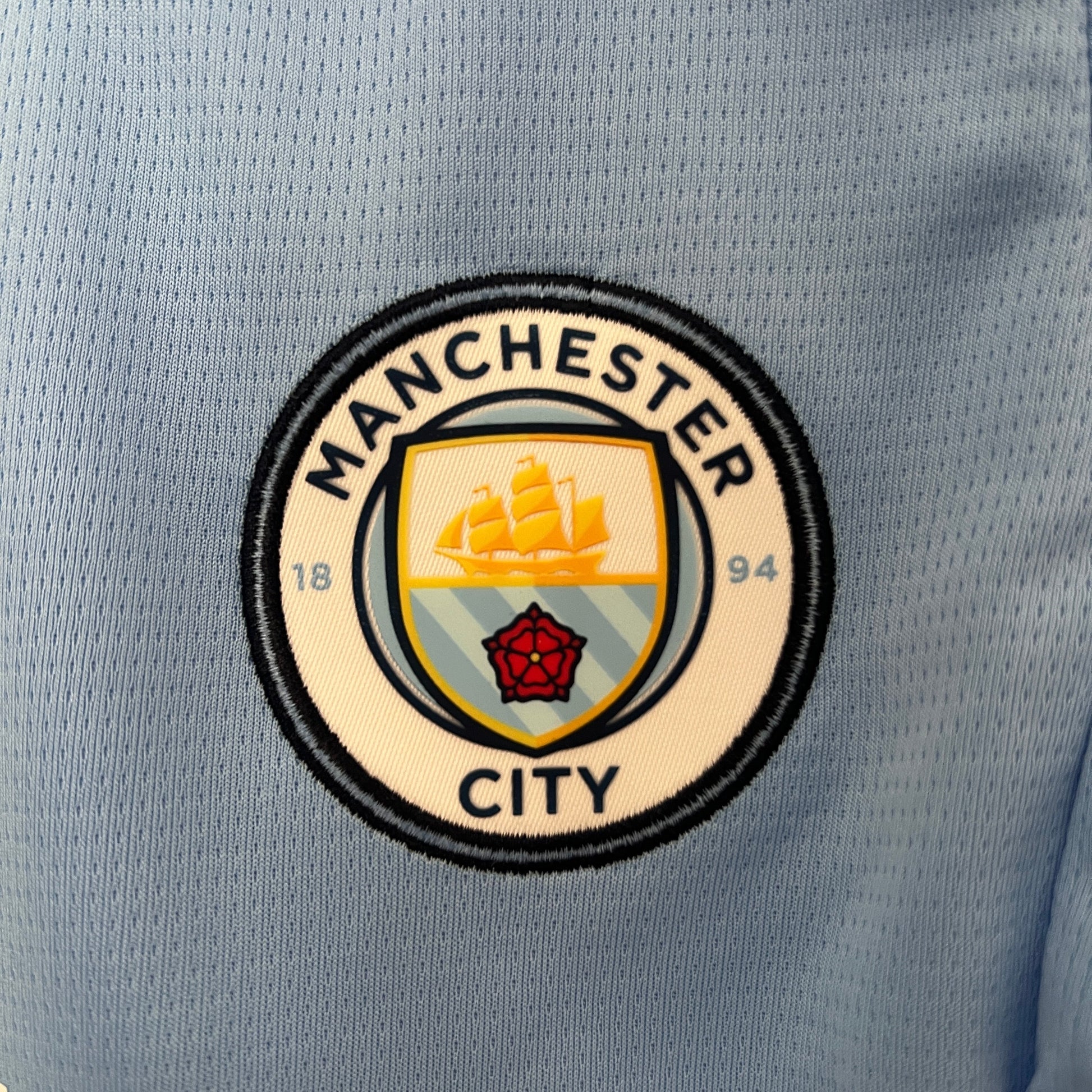 Manchester City 2024-25 Kids Jersey - Show your Manchester City pride while playing or cheering on the team